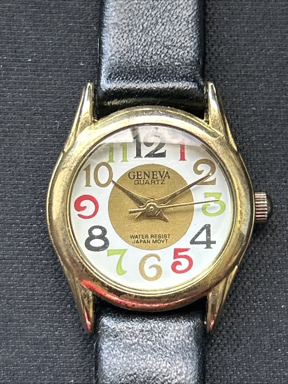 Geneva Gold Tone Black Band Women’s Quartz Watch